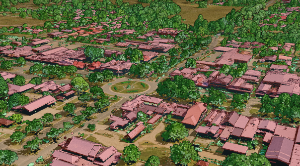 A LiDAR composite view showing a section of Mansfield taken from an angle looking down and across several streets. Manmade structures are displayed in shades of red, ground surfaces in shades of light brown, and trees and bushes in shades of green. A large roundabout is in the middle of the image, with houses positioned either side of several streets branching out from the middle. Trees line the main roads and are more clustered in the back yards of houses.