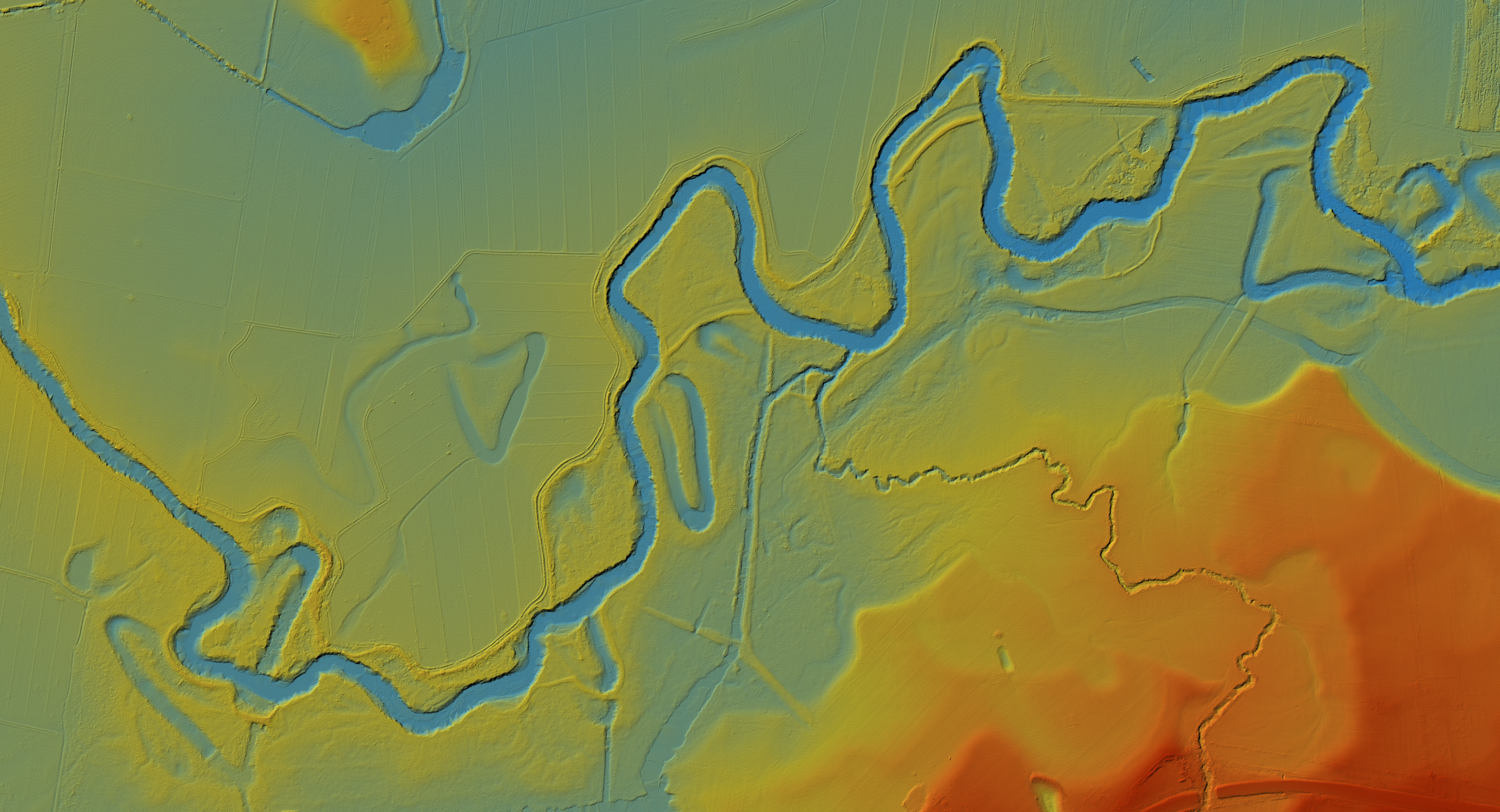 LiDAR aerial imagery over a section of river near Latrobe. Colour represents height, with the deeper points such as river bends and flood plains shaded in blues, the fields shaded in teals, greens and yelows, and higher points suggesting hills in the bottom right corner shaded in oranges and reds.