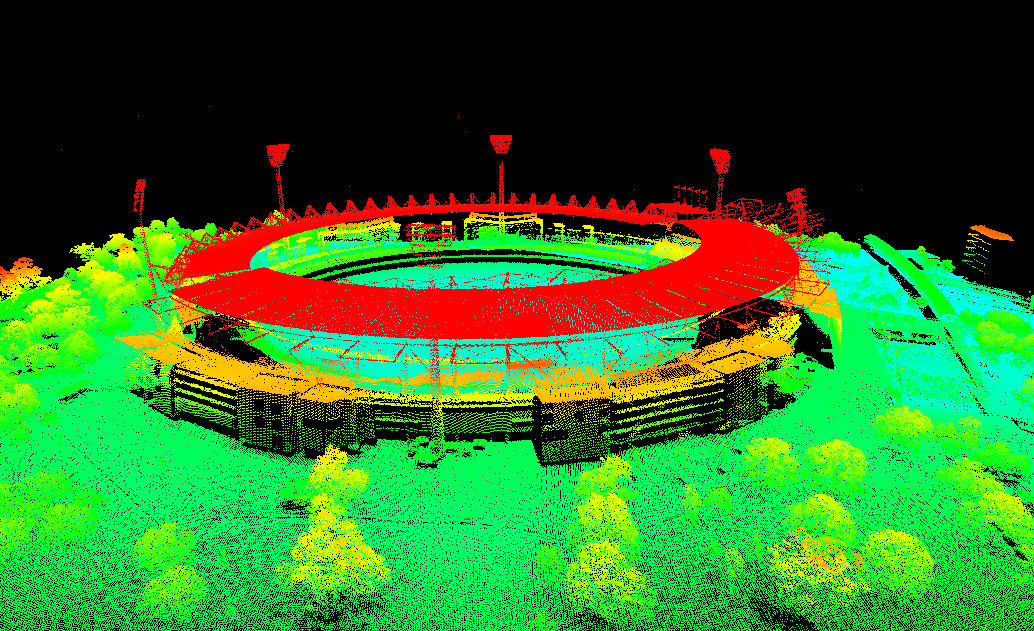 A point-cloud LiDAR image of the Melbourne Cricket Ground where colour represents the height of each point. The image is quite pixelated, with the lowest points coloured in aqua, mid-height points shaded greens and yelows, and the highest points shaded in oranges and reds. The red roof and lights over the MCG stand out against the background which is solid black. The stands appear mostly in shades of warm yellows, and the tree cover as mottled shades of green.