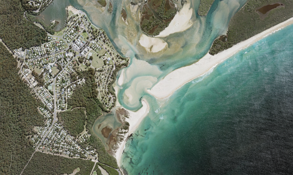 2017 aerial image of Mallacoota’s Wallagauragh River inlet open to the sea.