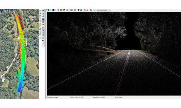 A computer screen shows two windows. The main window shows a derived image centred on a rural road at night, with tall trees flanking the road. The second tall and window to the left of the screen shows an aerial view of the same section of road, with the area in view from the main window colourised to show heights. Shades of deep blue depict the lowest heights towards the bottom end of the image, through to shades of red for the highest points of the trees at the top end of the image.