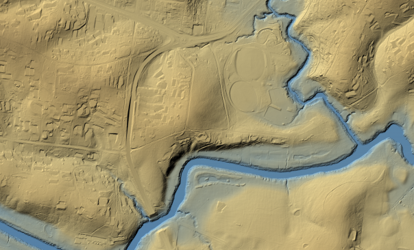 A LiDAR 1m representation of bare earth Melbourne, with shading and colour and shading used to show the contours of the landscape. Waterways are shaded in blue and the ground in earthy tones.